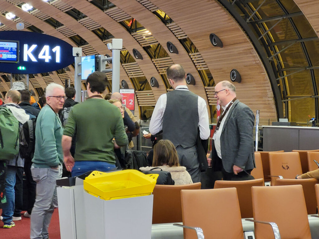 People wearing the "Bayern International" lanyards.